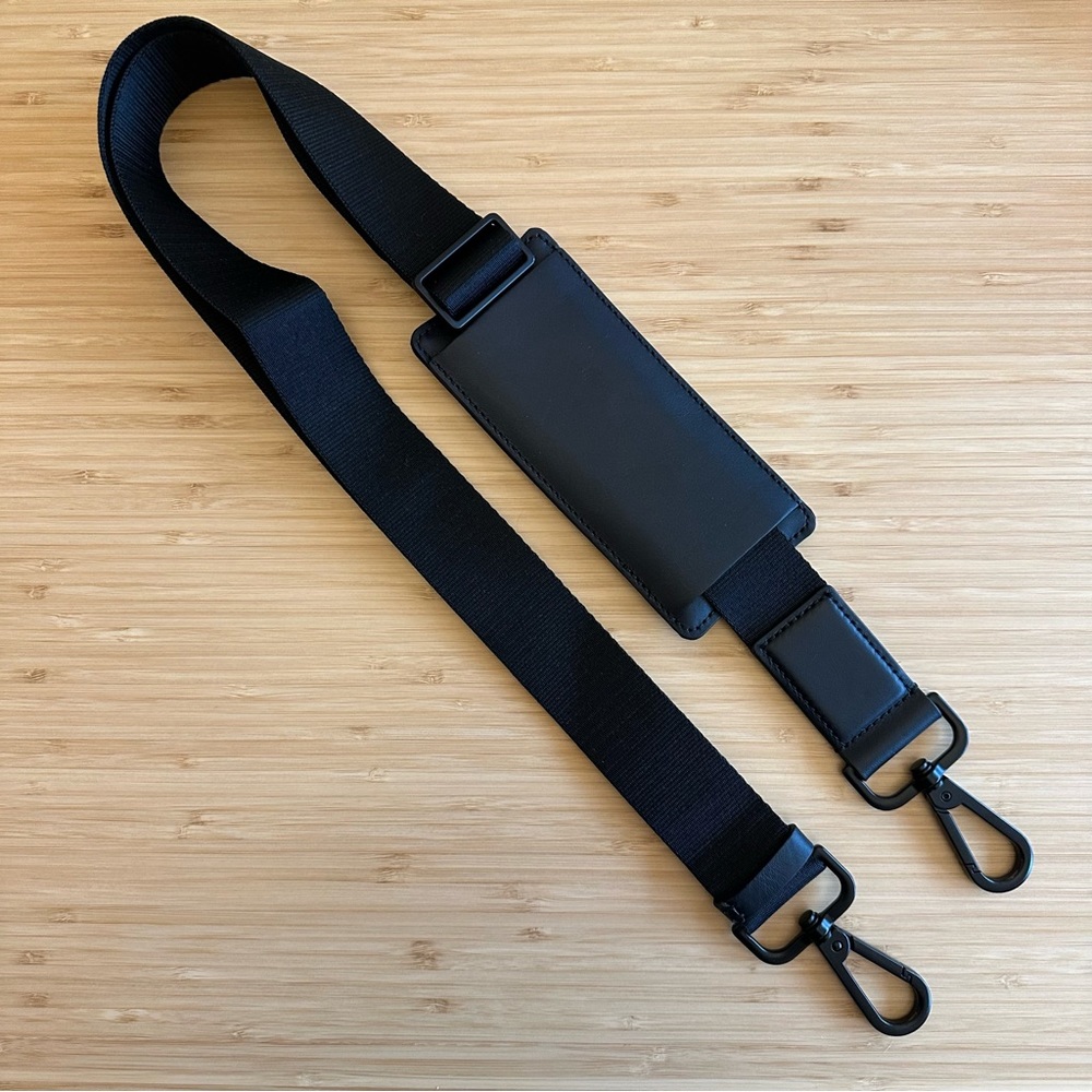 Adjustable Nylon Strap with Soft Shoulder Pad and Black Hardware for Away